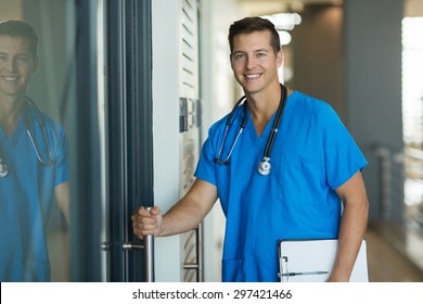 Portrait Of Handsome Doctor Opening His Office Door