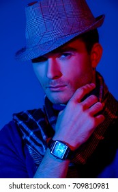 Portrait Of A Handsome Elegant Man In Blue And Red Light. Male Beauty, Fashion.