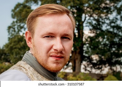 Portrait Of Handsome Ginger Hair Man Dressed In Regency Period Costume. Image With Selective Focus