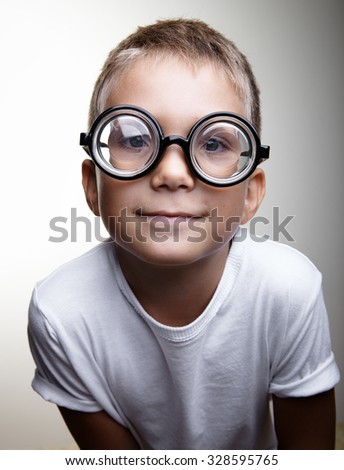 Similar – Child with magnifying glass