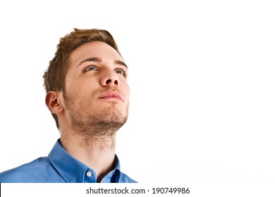 Portrait Of An Handsome Up Looking Up. Isolated On White