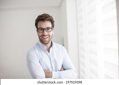 Portrait of an handsome man arm crossed
