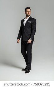 Portrait Of Handsome Man In Black Suit