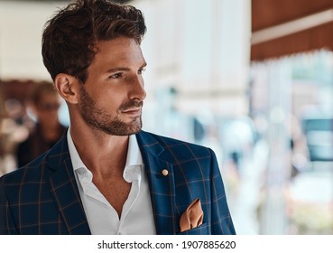 Portrait Of Handsome Man In Checked Suit 