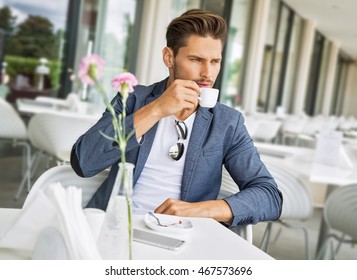 Portrait Of Handsome Man Drinking Espresso