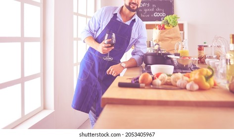 Portrait Of Handsome Man Filming Cooking Show Or Blog