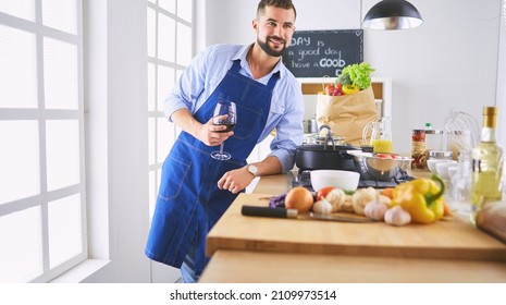 Portrait Of Handsome Man Filming Cooking Show Or Blog