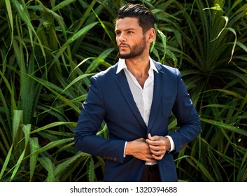 Portrait Of Handsome Man In Jungle