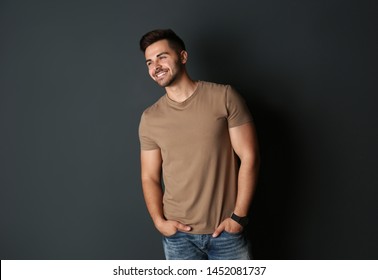 Portrait Of Handsome Man On Dark Background. Space For Text