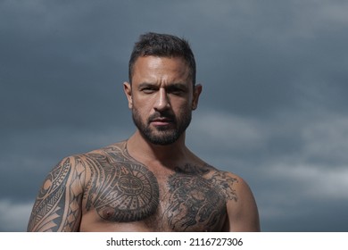 Portrait Of Handsome Man With Serious Face. Bare Strong Naked Torso.