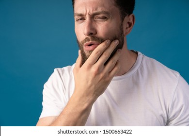 Portrait Of Handsome Man Who Looks Uncertain. Man Dressed Up To Go To The Bar With Girl He Met In Social Network But She Did Not Show Up. Why She Did Not Come. Question Botheres Our Hopeless Romantic.