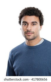 Portrait of a handsome middle eastern man in his 20s looking at camera with no expression isolated on white background