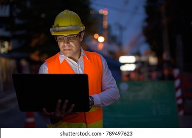 Portrait Of Handsome Persian Man Construction Worker At The Construction Site