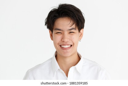 Portrait Of A Handsome Smile Face Tomboy, A Girl Who Loves To Be A Man, On White Background.