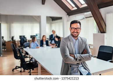 Portrait of handsome smiling businessman. - Shutterstock ID 1375421213