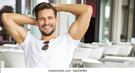 Portrait of handsome smiling man  - Shutterstock ID 466534481