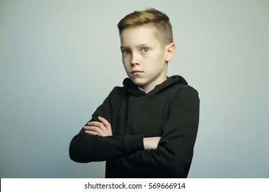 Portrait Of A Handsome Teenage Bad Boy With Stylish Haircut, Softbox Lighting Studio Shot.