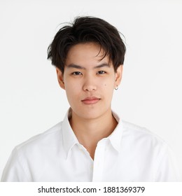 Portrait Of A Handsome Tomboy, A Girl Who Loves To Be A Man, On White Background.