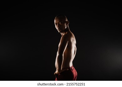 Portrait of handsome topless black male posing