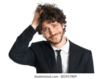 Portrait Of Handsome Uncertain Man Isolated On White Background