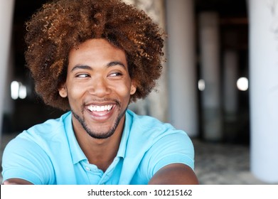 Portrait Of A Handsome Young African American Man At The Beach