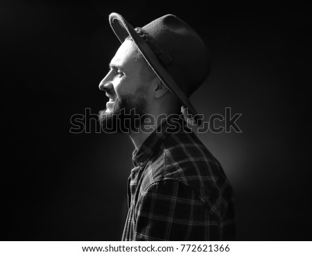 bearded guy in a cap