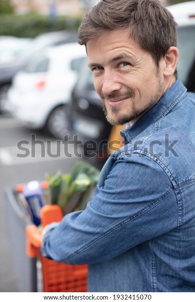 portrait of
handsome young man going to the
car