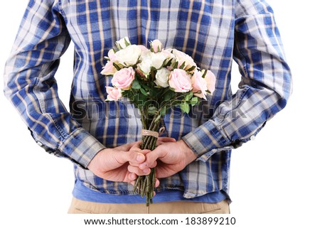 Similar – Man in jeans and plaid shirt with some white flowers in his hand