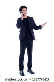 Portrait Of Handsome Young Man Talking On Phone Over White Background