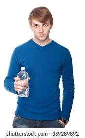 Portrait Of A Handsome Young Man With A Water Bottle Over A White Background