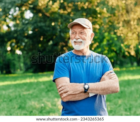 Portrait of a happy active senior posing after exercising outdoors