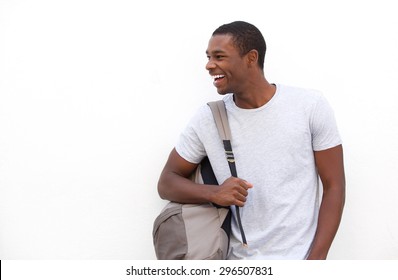 Portrait Of A Happy African American College Student With Bag On Isolated White Background