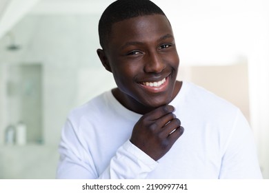 Portrait Of Happy African American Man Smiling To Camera In Bathroom. Inclusivity, Self Care, Health And Positivity, Spending Time Alone At Home.