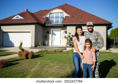 Portrait Of Happy American Military Family Welcoming Father Soldier Coming Home.