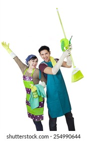 Portrait Of Happy Asian Couple With Spring Cleaning Tools, Isolated On White Background