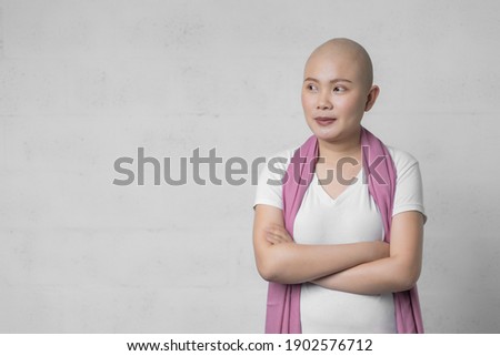 Portrait of happy Asian girl breast cancer survivor