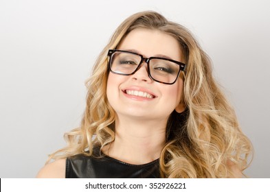 Portrait of happy attractive fashionable young woman