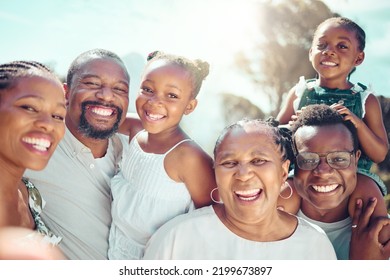 Portrait, happy black big family and love as they smile on vacation, trip or holiday. Ancestry, African people or grandparent, fathers and mother with kids together in the shining sun or sunshine. - Shutterstock ID 2199673897