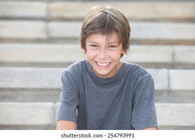 portrait of a happy boy outdoors