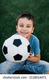 Portrait Happy Boy Sitting On Football Stock Photo 2118014471 ...