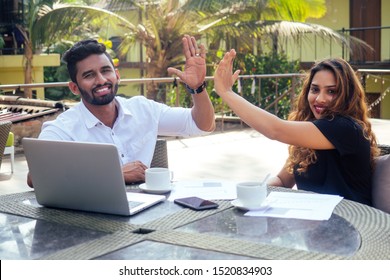 Portrait Of Happy Businesswoman And Businessman At Summer Tropical Cafe.freelance And Remote Work.woman And Arab Man Couple In Love Work Together On The Shore Of India Ocean