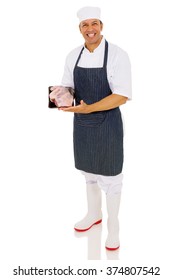 Portrait Of Happy Butcher Showing Fresh Meat Isolated On White Background