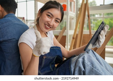 Portrait Of Happy Carpenters Designing And Planing Wood Products In Workshop, Smiling Couple Of Joiners In Joinery, Woodworking Job Concept