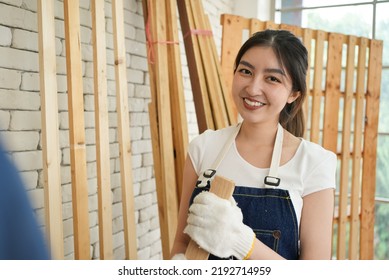 Portrait Of Happy Carpenters Designing And Planing Wood Products In Workshop, Smiling Couple Of Joiners In Joinery, Woodworking Job Concept