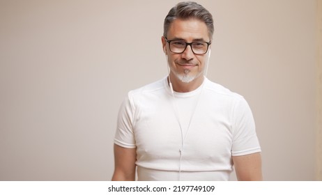 Portrait Of Happy Casual Older Man Smiling, Mid Adult, Mature Age Guy With Gray Hair In Glasses, Isolated On White Background, Copy Space.