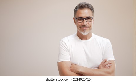 Portrait Of Happy Casual Older Man Smiling, Mid Adult, Mature Age Guy With Gray Hair In Glasses, Isolated On White Background, Copy Space.