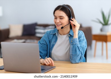 Portrait Of Happy Caucasian Female Employee Customer Support Services In Headset Sitting In Modern Office, Online Consultation. Woman Call Center. Smiling Female Customer Support Or Sales Agent