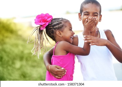 Portrait of happy children playing outdoors - Powered by Shutterstock