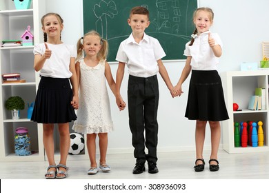 Portrait Happy Classmates Looking Camera Classroom Stock Photo ...