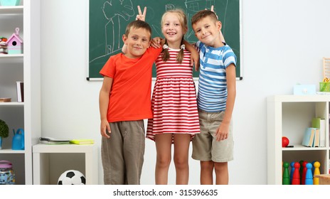 Portrait Happy Classmates Looking Camera Classroom Stock Photo ...